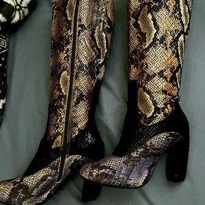 Two lips almost knee-high snake skin boots